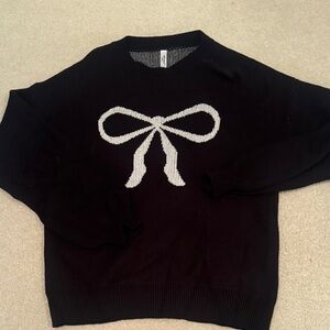 ePretty Black Crewneck Sweater with White Bow Graphic
